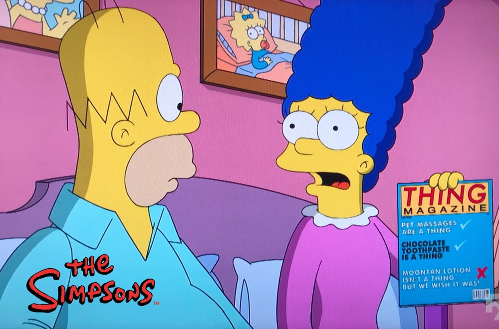 The Simpsons scene with Marge holding a magazine about chocolate toothpaste